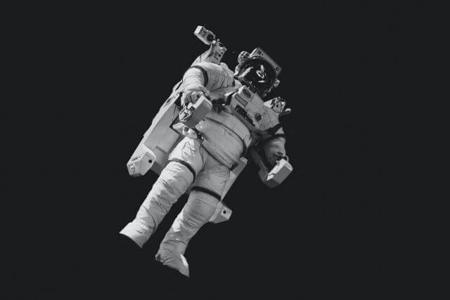 Image depicting a solitary astronaut floating in the vast expanse of space, set against a backdrop of distant stars and galaxies. The astronaut, symbolizing exploration and the pursuit of knowledge, is gracefully poised in the zero-gravity environment, illustrating the concept of navigating through the complexities of information technology. The endless space around the astronaut reflects the boundless opportunities for learning and growth in the field of IT, aligning with the website's mission to explore and simplify the vast universe of IT topics for a diverse audience.
